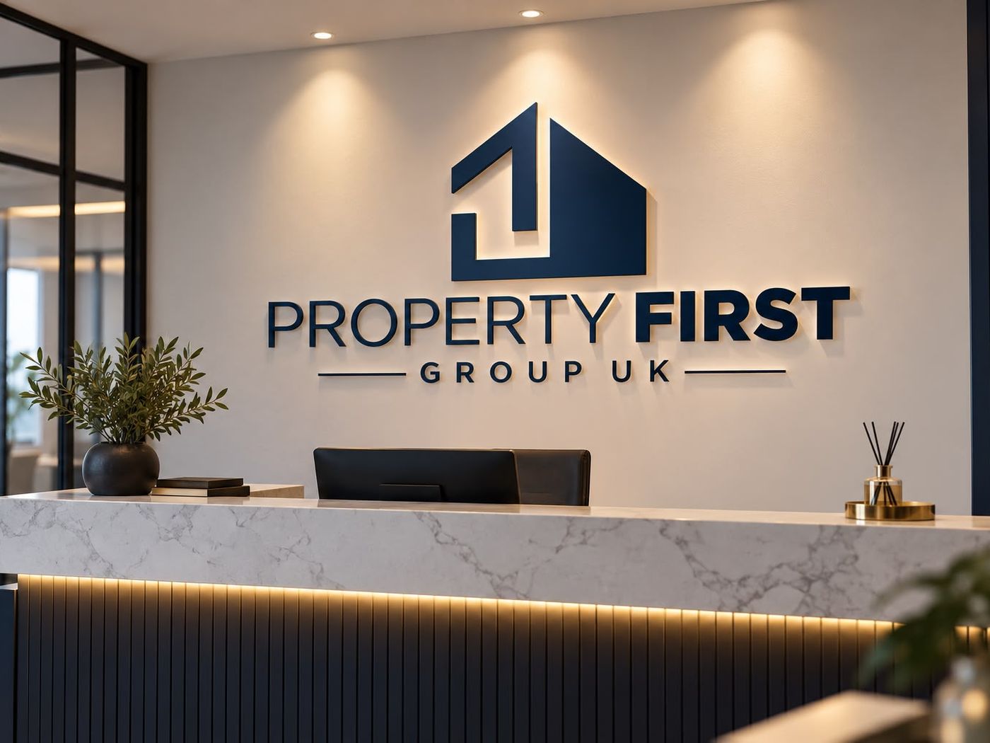 Property First Group UK logo on a reception wall