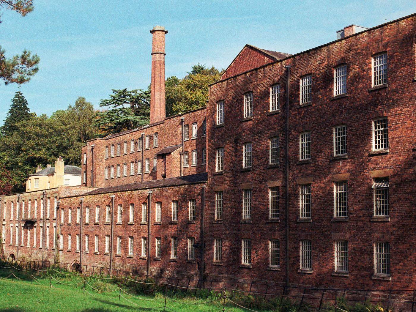 Historic red-brick mill building, the type often converted into apartments